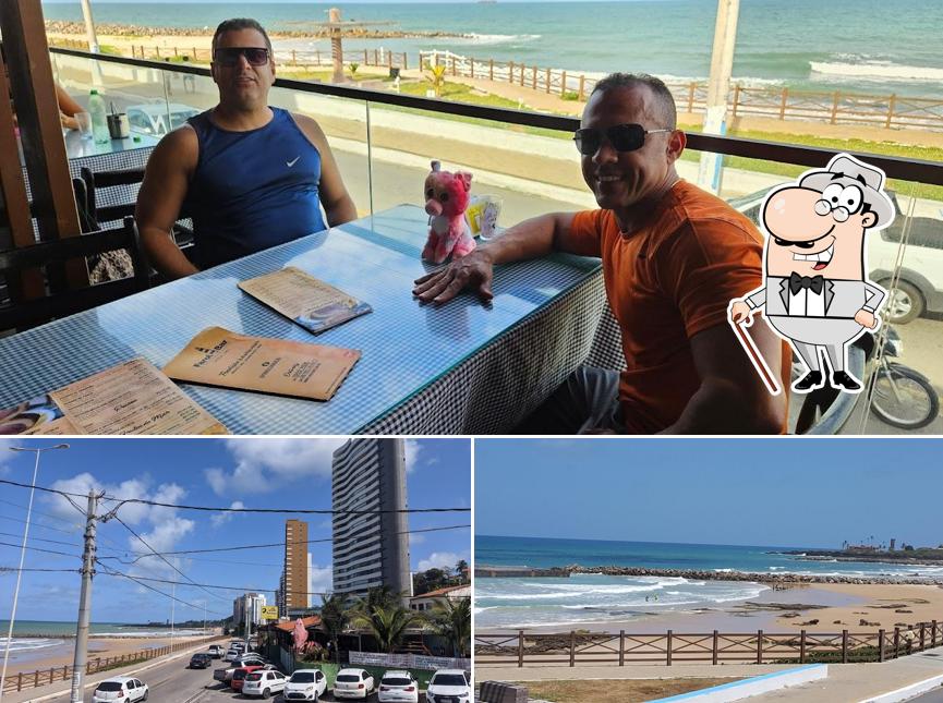 Você pode espairecer no na área externa do Farol Bar e Restaurante
