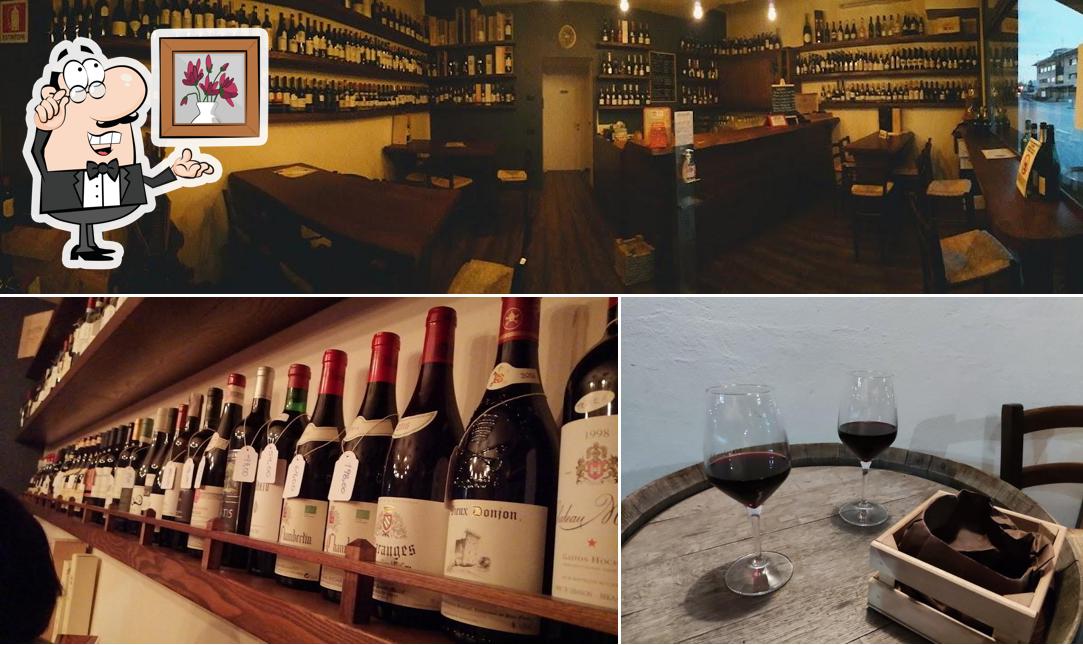 Siediti a un tavolo di Enoteca La Magnum