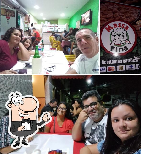 O interior do Pizzaria Massa Fina