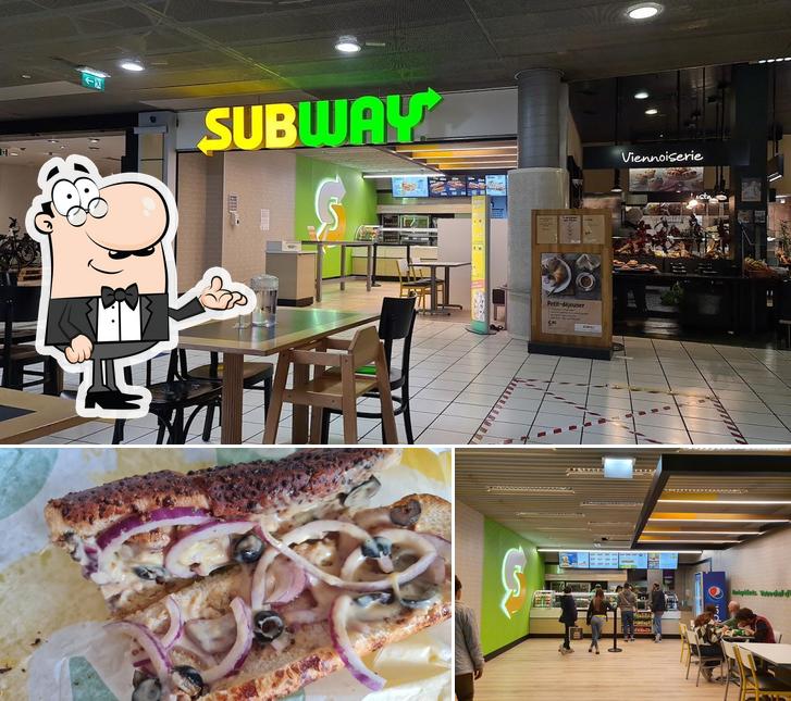 Dai un’occhiata alla foto che presenta la interni e cibo di Subway
