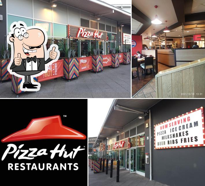 Взгляните на изображение пиццерии "Pizza Hut"