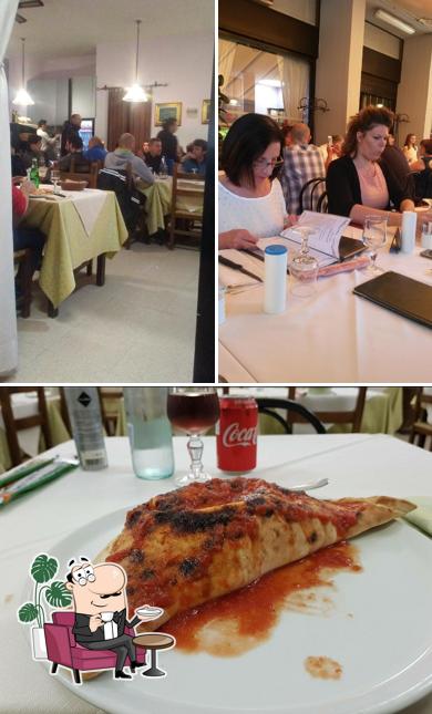 Ristorante Pizzeria Bel Ami' Di Fu Qiuhua si caratterizza per la interni e cibo