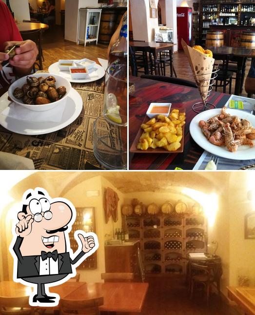 Estas son las fotos que muestran interior y comida en La Taverna Gastrobar