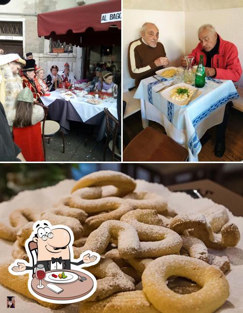 La immagine della tavolo da pranzo e cibo di Al Bagolo