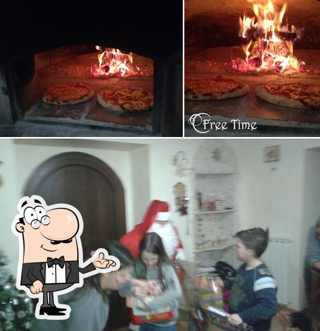 Dai un'occhiata agli interni di Pizzeria Free Time