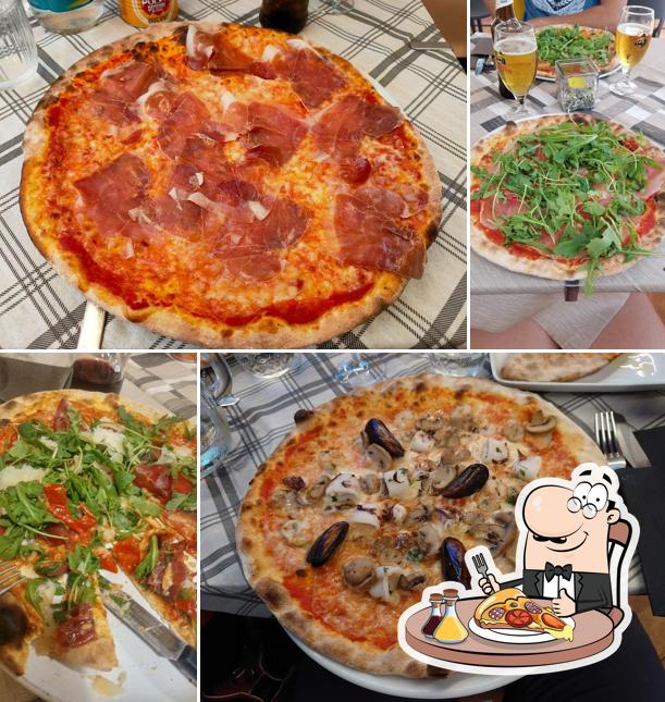 Prenez des pizzas à La Mela - Pizzeria Ristorante