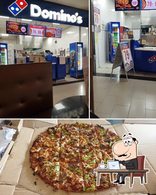 Voici l’image indiquant la intérieur et pizza sur Domino's Pizza ( Fés)