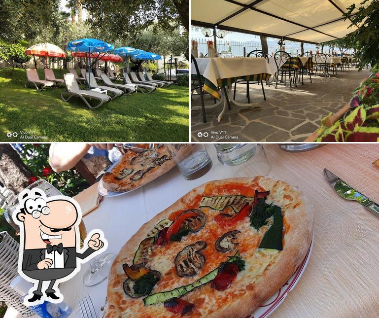 Parmi les diverses choses de la intérieur et la pizza, une personne peut trouver sur Ristorante Garden, Torri