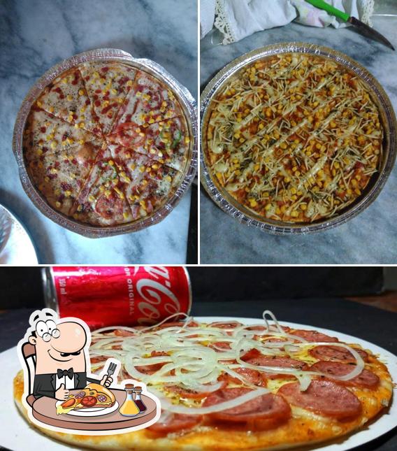 Escolha pizza no Stelle Pizzaria