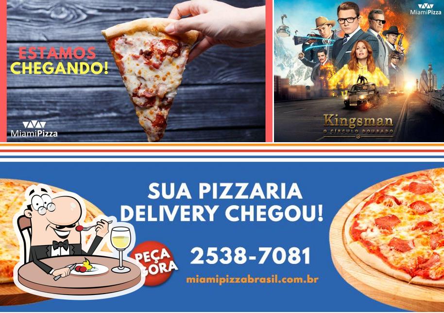 A imagem da comida e exterior a Miami Pizza