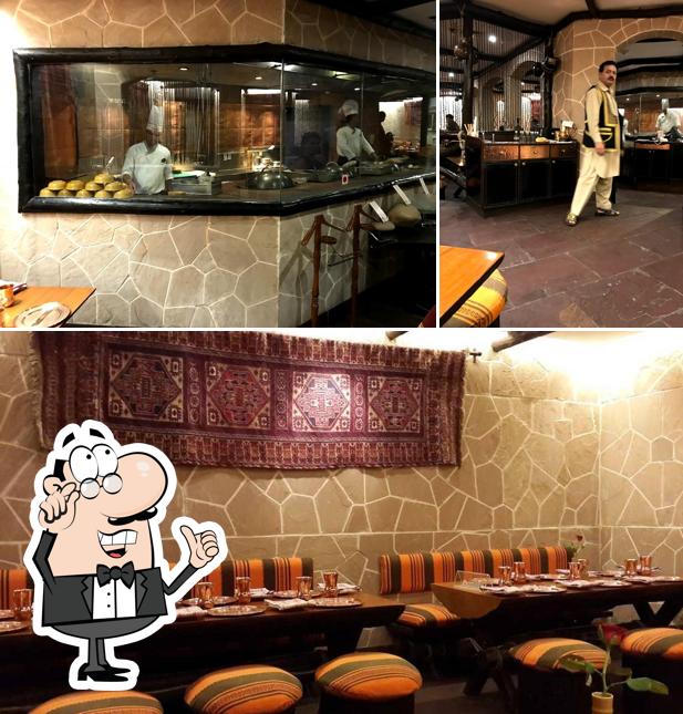 Take a seat at one of the tables at PESHAWRI