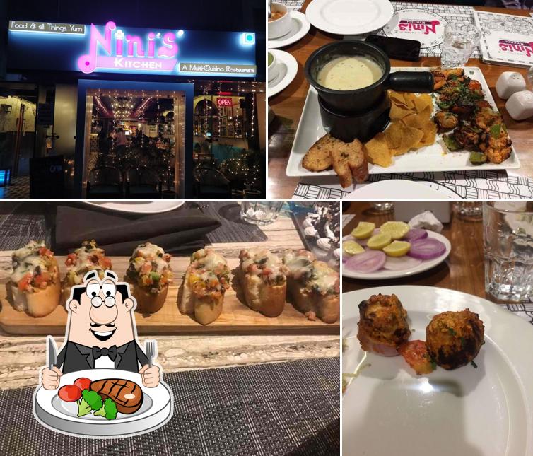 Order meat meals at Nini's Kitchen - Piplod, Surat