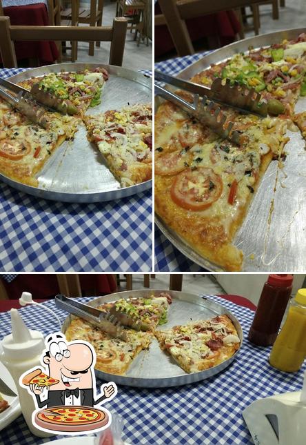 Escolha pizza no Restaurante e Pizzaria Alvorada