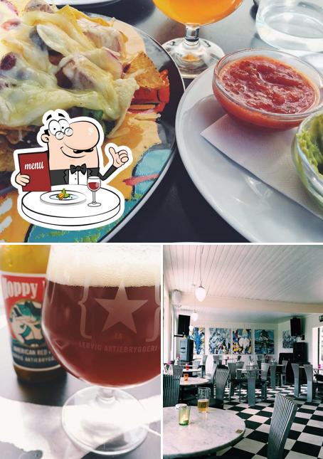Посмотрите на это изображение, где видны еда и пиво в Café Sting