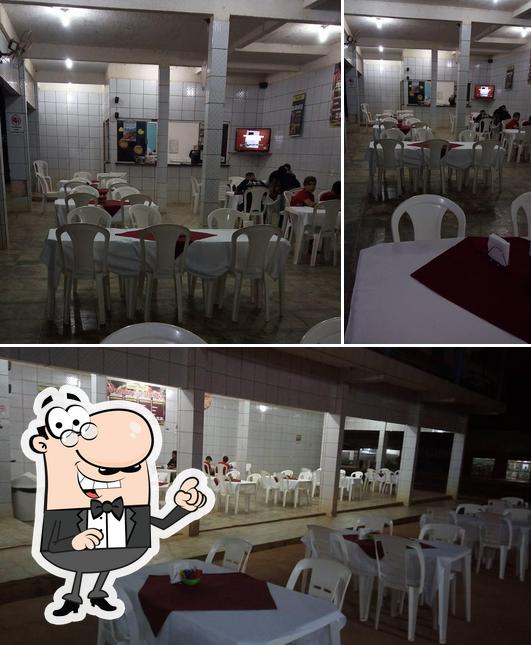 O interior do Point Brasil Pizzaria E Gourmet