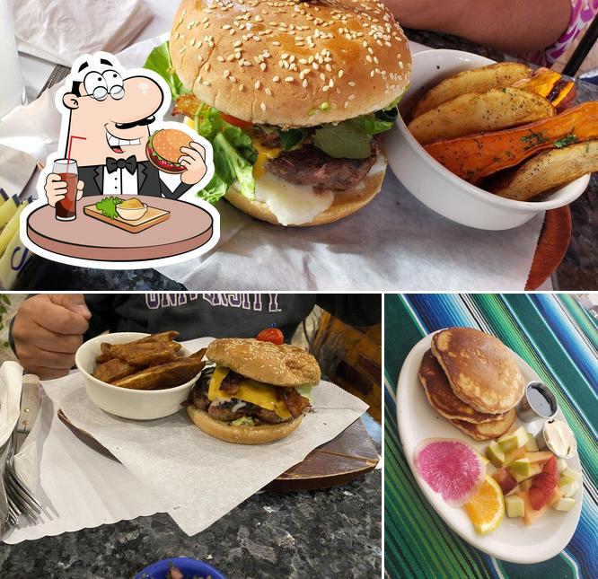 Order a burger at Enelmar Restobar & Beach garden