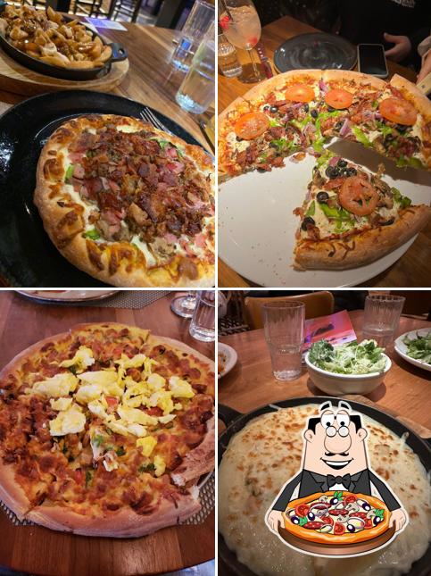 Prenez des pizzas à Délice Resto Lounge