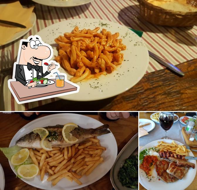 Konoba Stari grad si caratterizza per la cibo e tavolo da pranzo