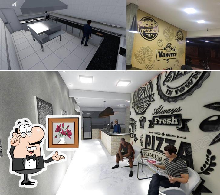 Veja imagens do interior do Pizzaria Vanucci