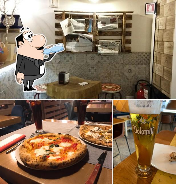 Among various things one can find drink and pizza at Fuoco Matto