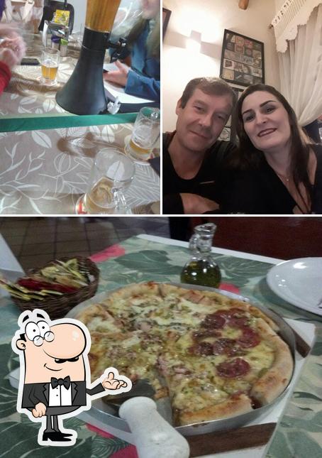 Estas son las fotos donde puedes ver interior y pizza en Restaurante e Pizzaria Bear House