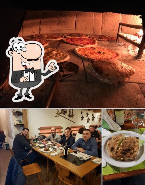 Dai un'occhiata agli interni di Green Bar Pizzeria