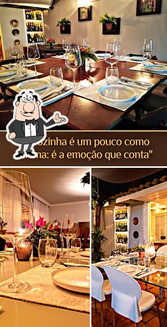 A imagem da interior e mesa de jantar no Ghada Cuisine