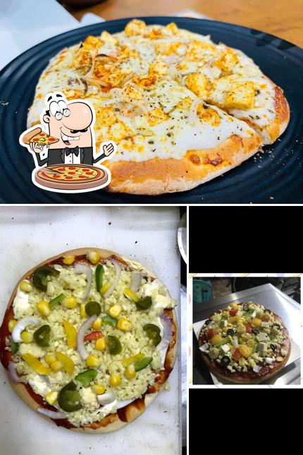 Try out pizza at Sandwich House & Cafe