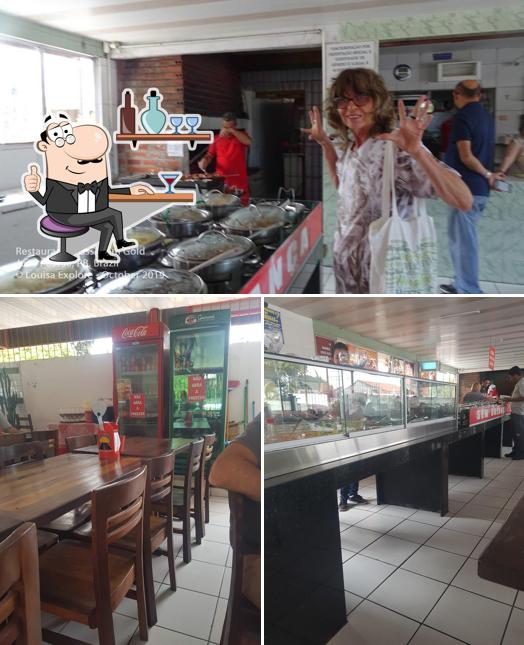 O interior do Restaurante Passagem Gold