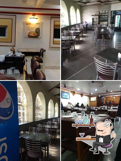 Take a seat at one of the tables at George Restaurant