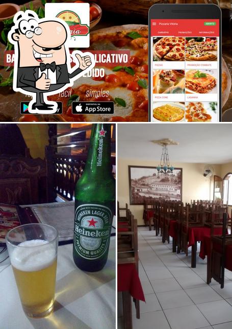 Look at the picture of Pizzaria Vitória