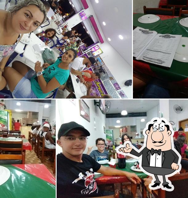 O interior do Pizzaria Água na Boca