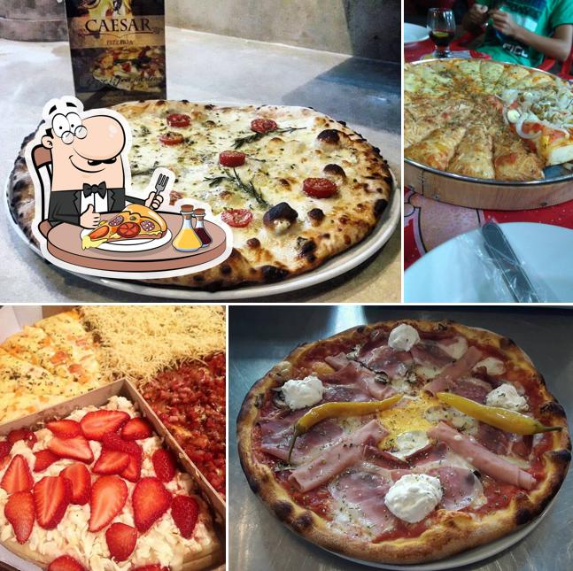 No Cézar Pizzaria - Pizza e Lanches, você pode degustar pizza