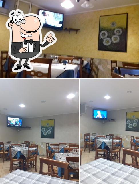 El interior de King Of Pizza