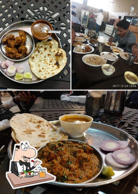 The picture of food and dining table at Hotel Shiv Leela