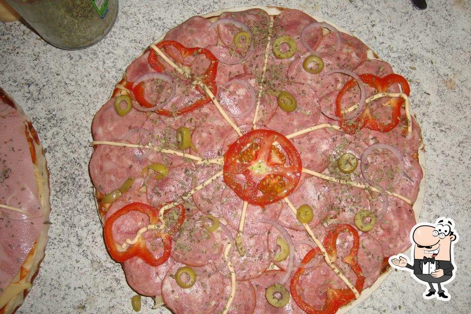 Look at the picture of D.R pizzas