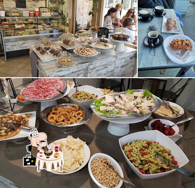 TINKA BAR & BISTROT si caratterizza per la cibo e tavolo da pranzo