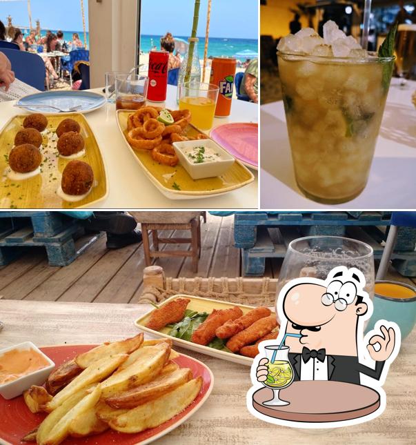 Among various things one can find drink and dining table at Beach Bar chiringuito Takuara