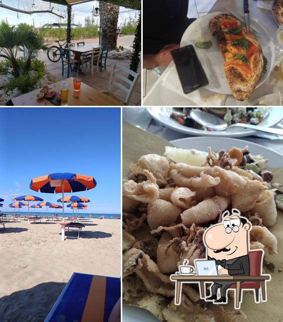 Siediti a un tavolo di Ristorante pizzeria Bahia azzurra Beach club