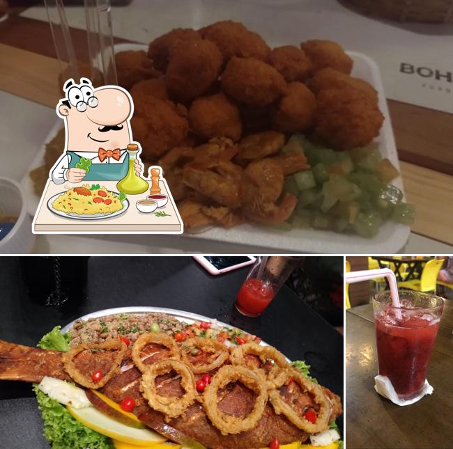 Confira a foto mostrando comida e bebida no Caranguejo de Vilas