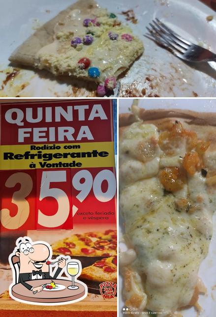 Comida em Pizzaria Mia