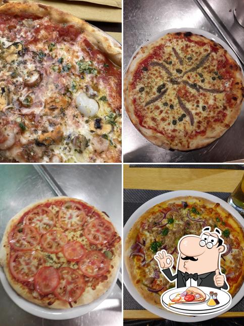 Bei Pizzeria & Caffe Bar "Oliva" könnt ihr Pizza genießen