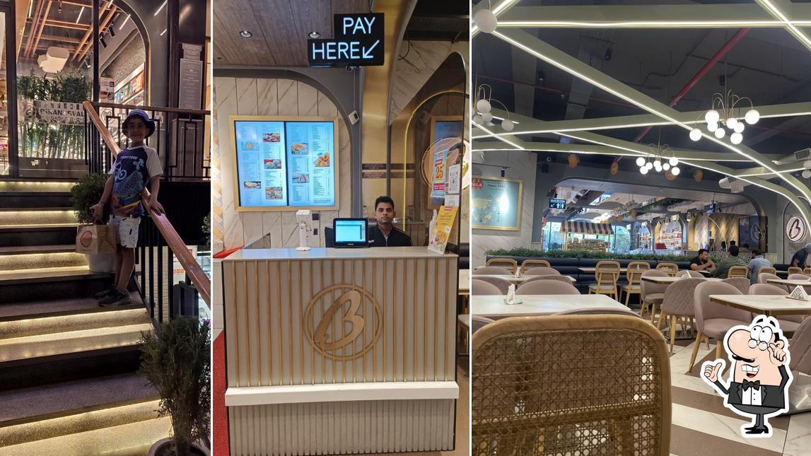 Take a seat at one of the tables at Bikanervala