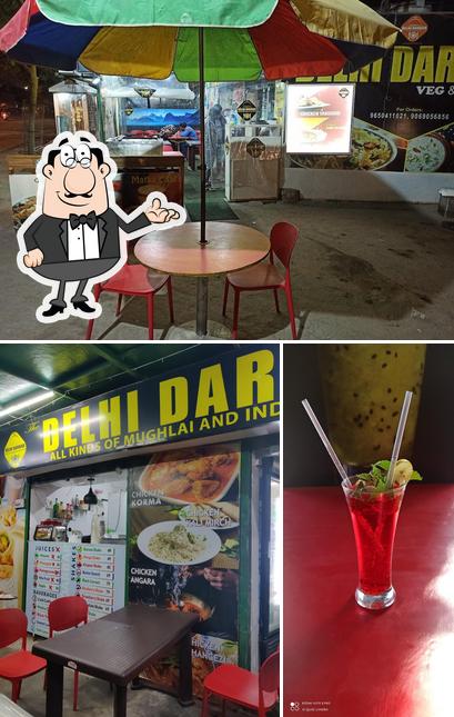 Among different things one can find interior and beverage at Delhi Darbar Restaurant