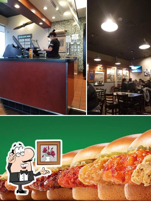 Take a look at the picture displaying interior and food at Wingstop