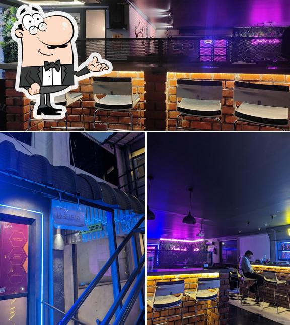 Take a look at the picture showing interior and food at PITSTOP 55 RESTOBAR