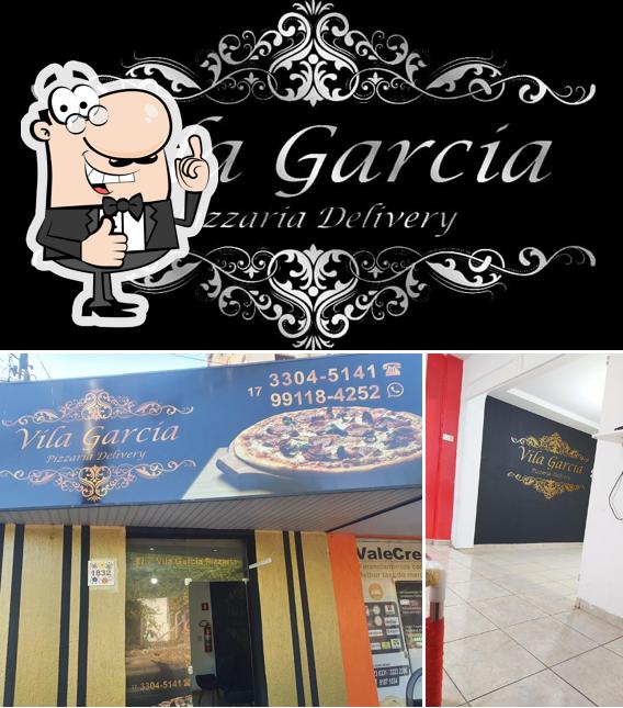 Look at the picture of Vila Garcia Pizzaria Delivery