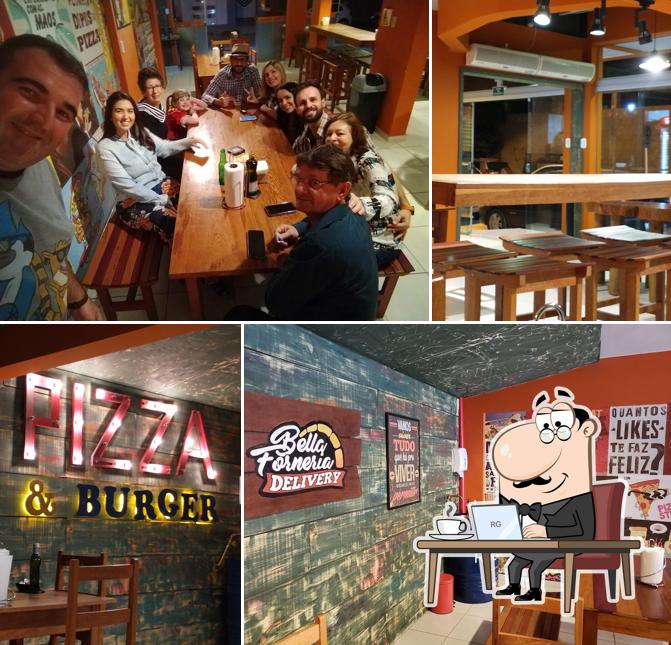 Sente em uma das mesas no Bella Forneria Pizzeria