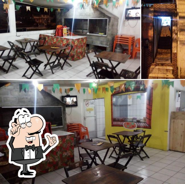 O interior do Pizzaria Do Jao