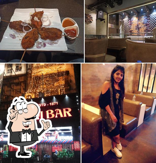 The image of Saqi Bar and Restaurant’s interior and food